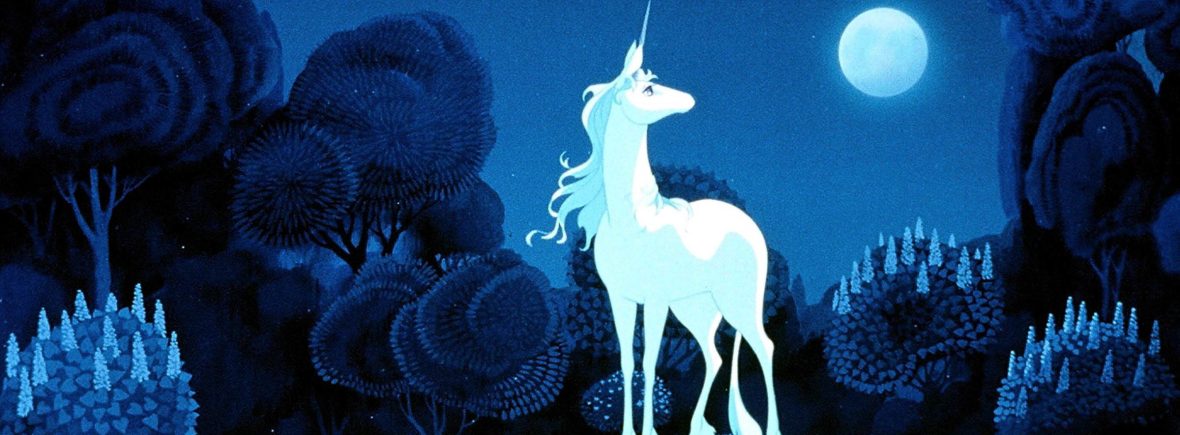 The Last Unicorn. She's standing on a hill in her forest, looking at a full moon.